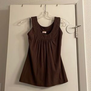 Brown tank with gold studs
